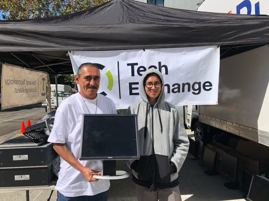 Tech Exchange Volunteers At Distribution Event