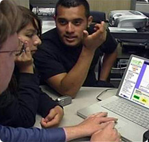 Students learning on a computer