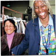 2 Smiling women at Goodwill Industries