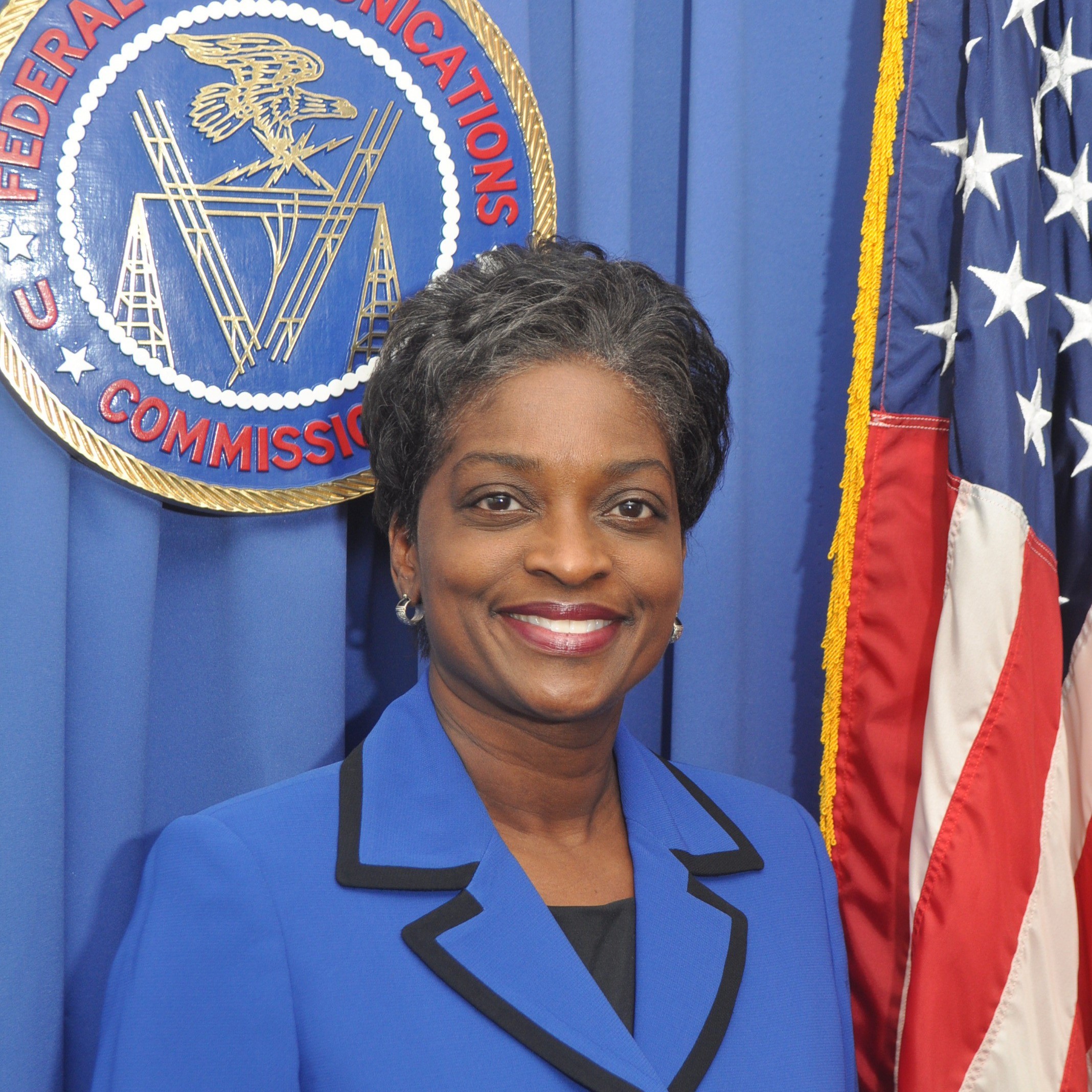 Image of Mignon Clyburn wearing blue jacket and smiling