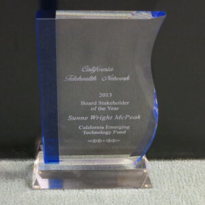 Photo of glass placard award: California Telehealth Network 2013 Board Stakeholder of the Year